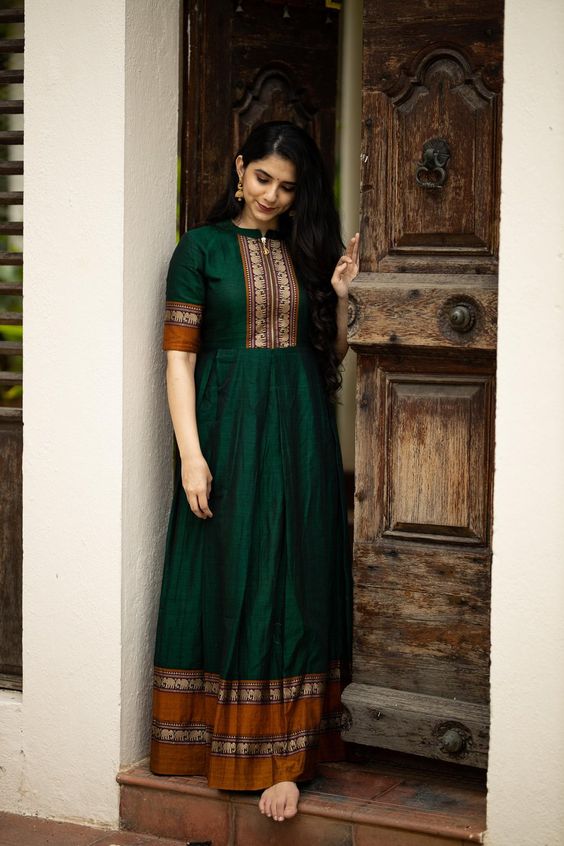 High Demanding Beautiful Dark Green colored Jacquard Gown